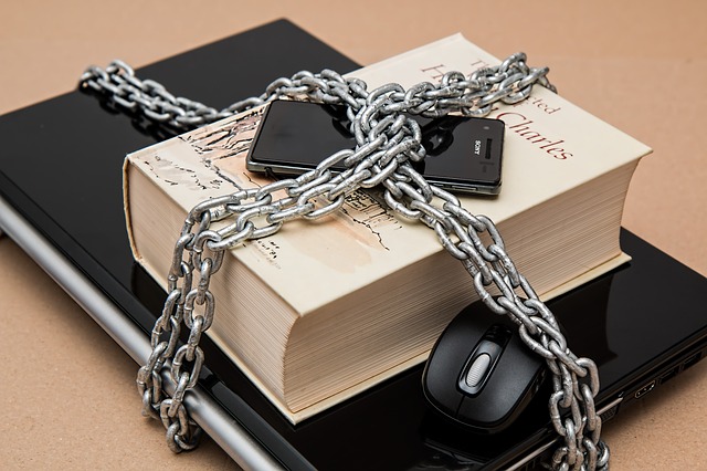 Computer and information materials secured by a chain